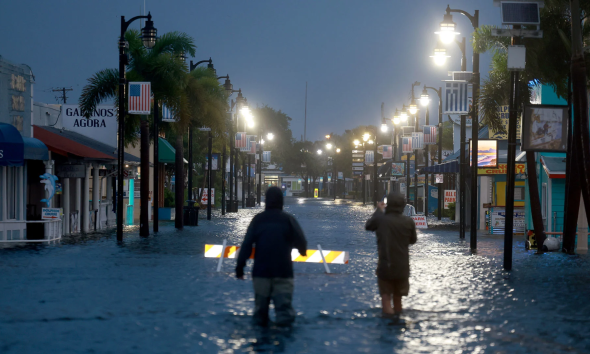 How does commercial insurance policy define hurricane risk?